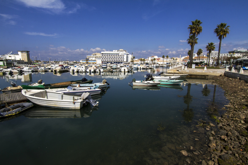 View of a beautiful marina with boats in Faro, Portugal.